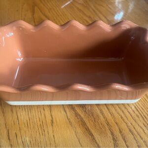 Emile Henry William Sonoma ceramic orange ruffle loaf pan